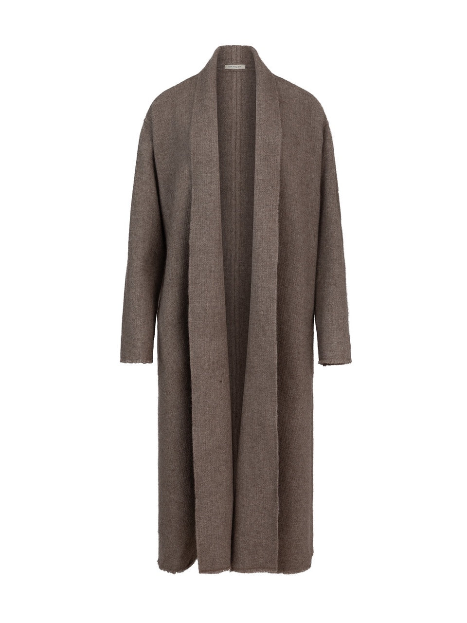 Bohemian chic layering Geneva Gstaad St Moritz — Stephanie yak coat taupe alpine wardrobe